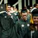 An Eastern Michigan University graduate receives a diploma during the Spring Commencement on Sunday, April 28. Daniel Brenner I AnnArbor.com